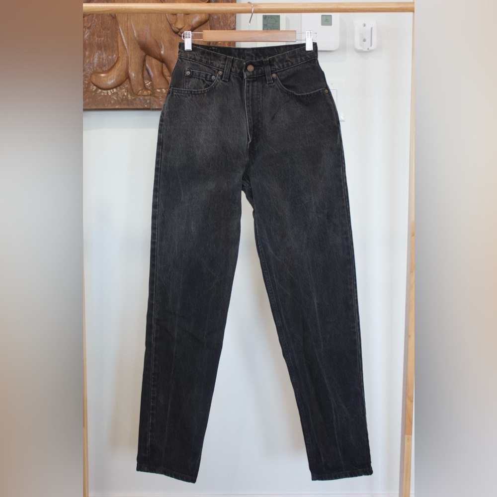 Levi’s | 521 high waist distressed black jeans